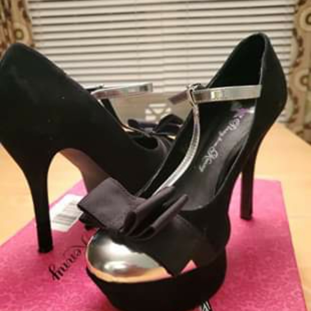 Black suede silver cap toe pumps